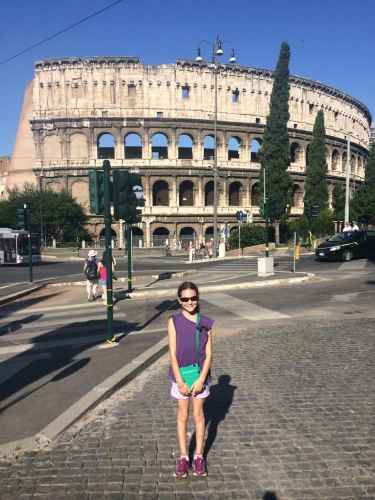 Hannah in front of the colosseum in rome