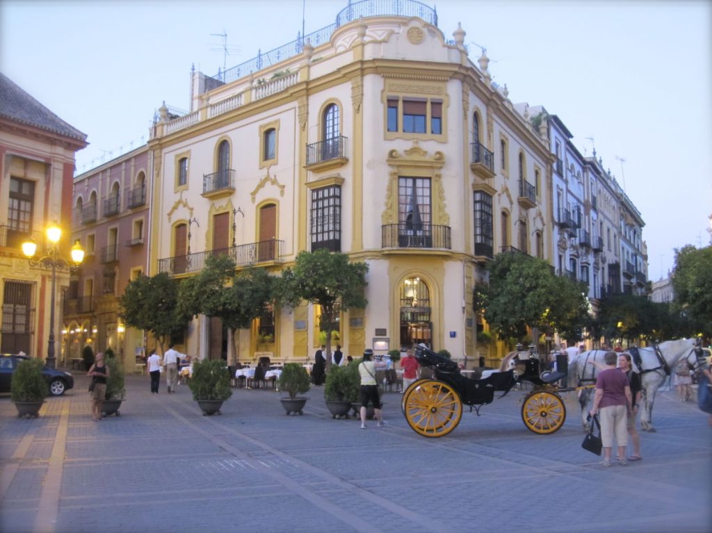 Plaza with horse and carriage in Seville