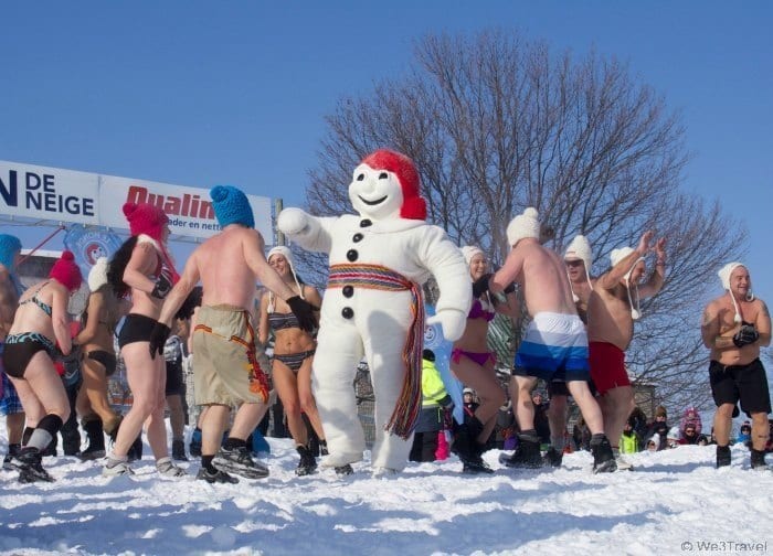 10 Reasons to visit the Quebec Winter Carnival -- Ok, maybe not taking a snow bath with Bonhomme, but it is fun to watch.