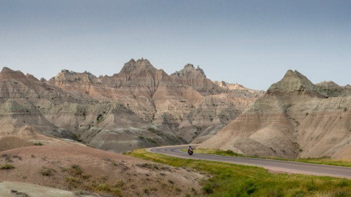 Badlands national park road with motorcycle