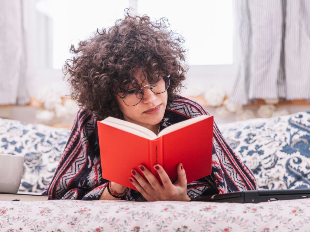 Teen girl reading a book