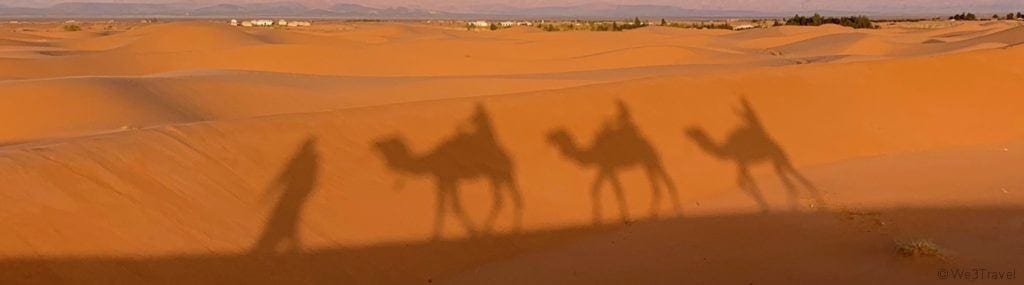 Morocco trip budget shadows on Sahara dunes