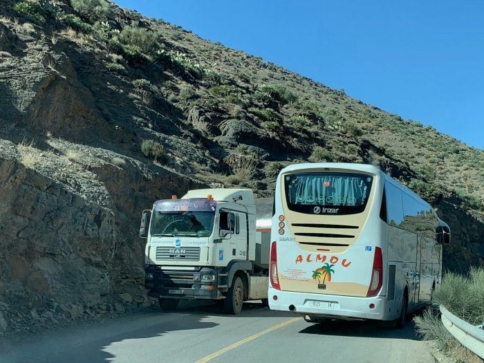 bus passing truck in Morocco
