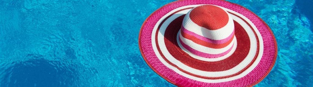 Packable sun hat floating in water
