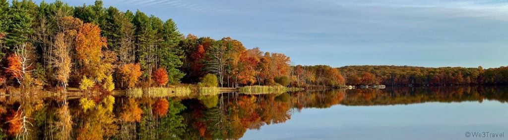 Fall colors reflecting on the lake in Lincoln Woods Rhode Island