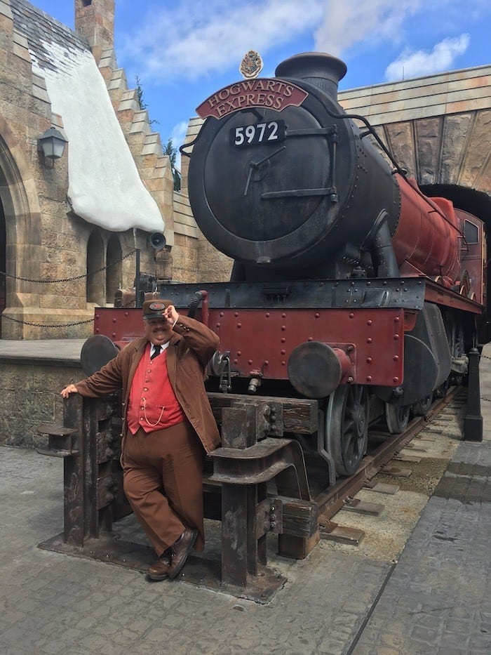 Hogwarts express train and conductor in Hogsmeade