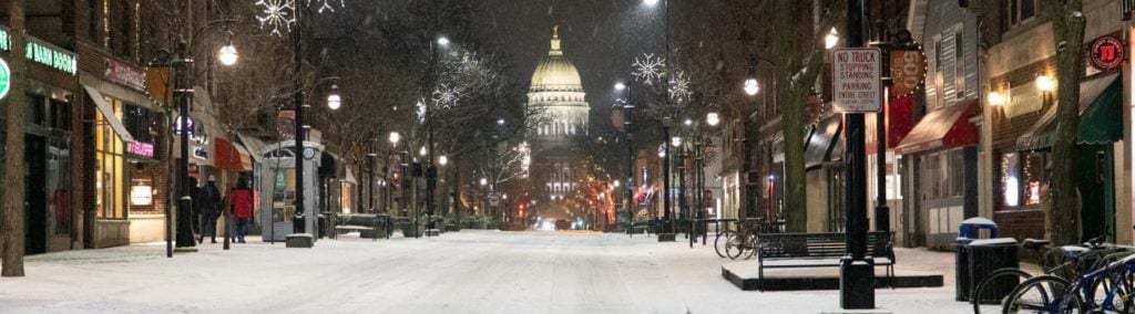 Wisconsin State Capitol building at night in the snow