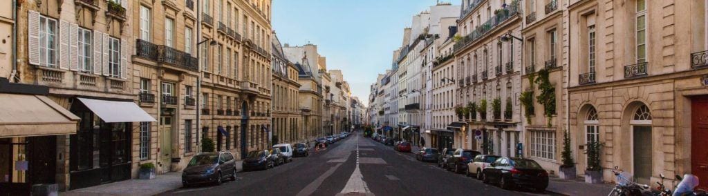 Paris street scene with cars parked