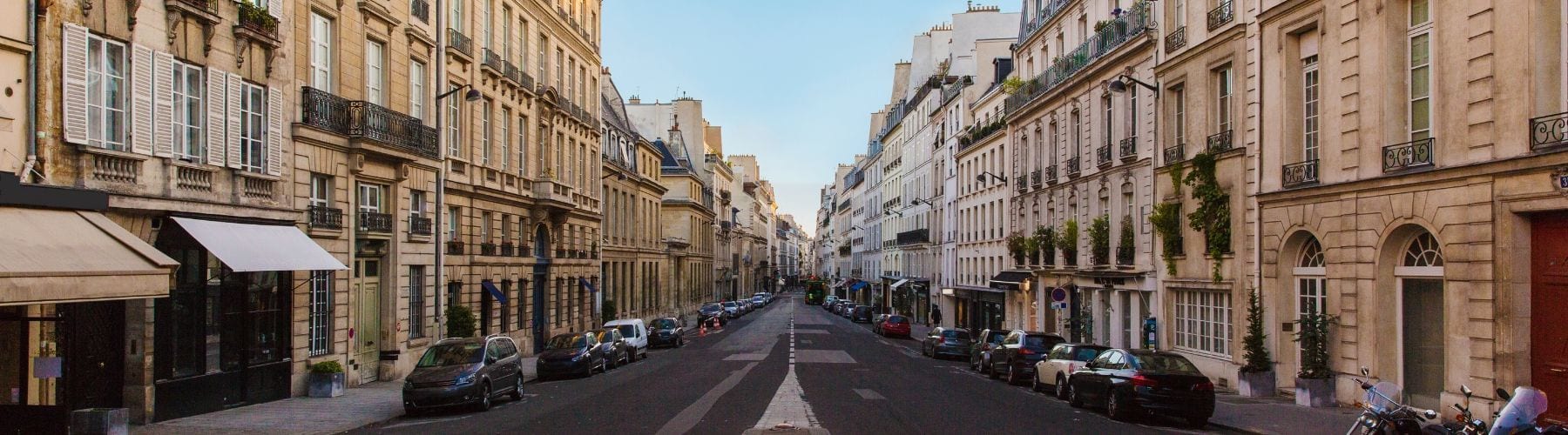 Paris street scene with cars parked