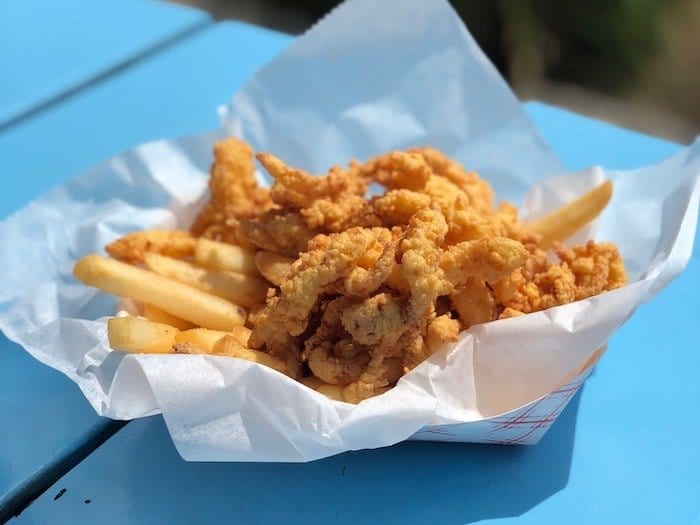 fried clams at Bob's Clam Shack in Kittery maine on a blue table