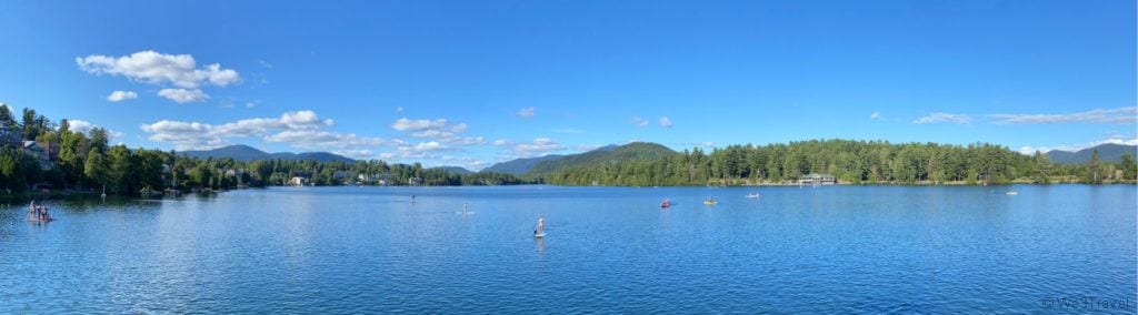 Paddle boards and kayaks on Mirror Lake new york
