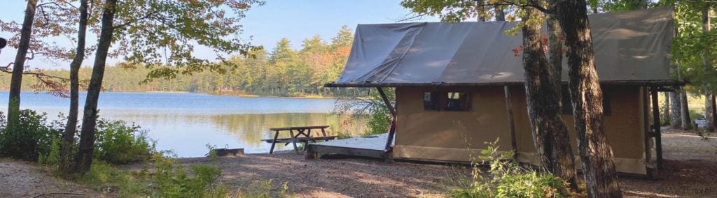 Huttopia White Mountains glamping tent next to the lake