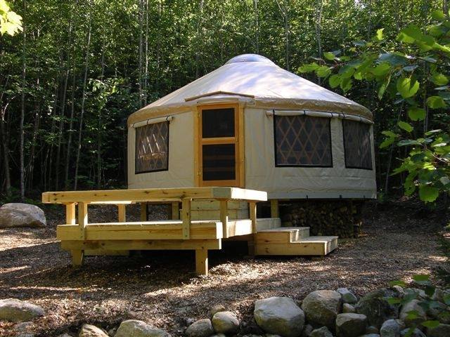 Frost Mountain Yurts Mountain view white yurt with porch