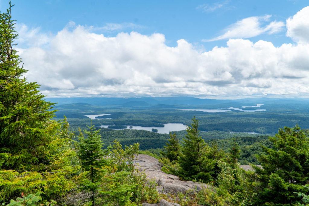 View of lakes and trees from the top of St Regis Mountain