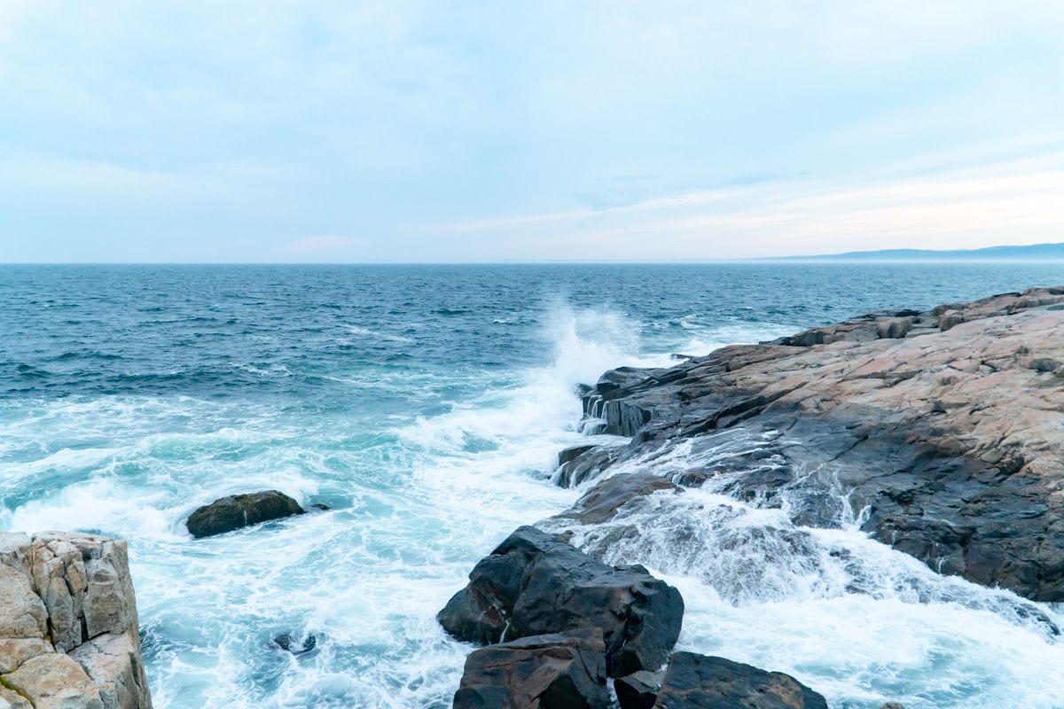 waves crashing on rocks at Schoodic Point 