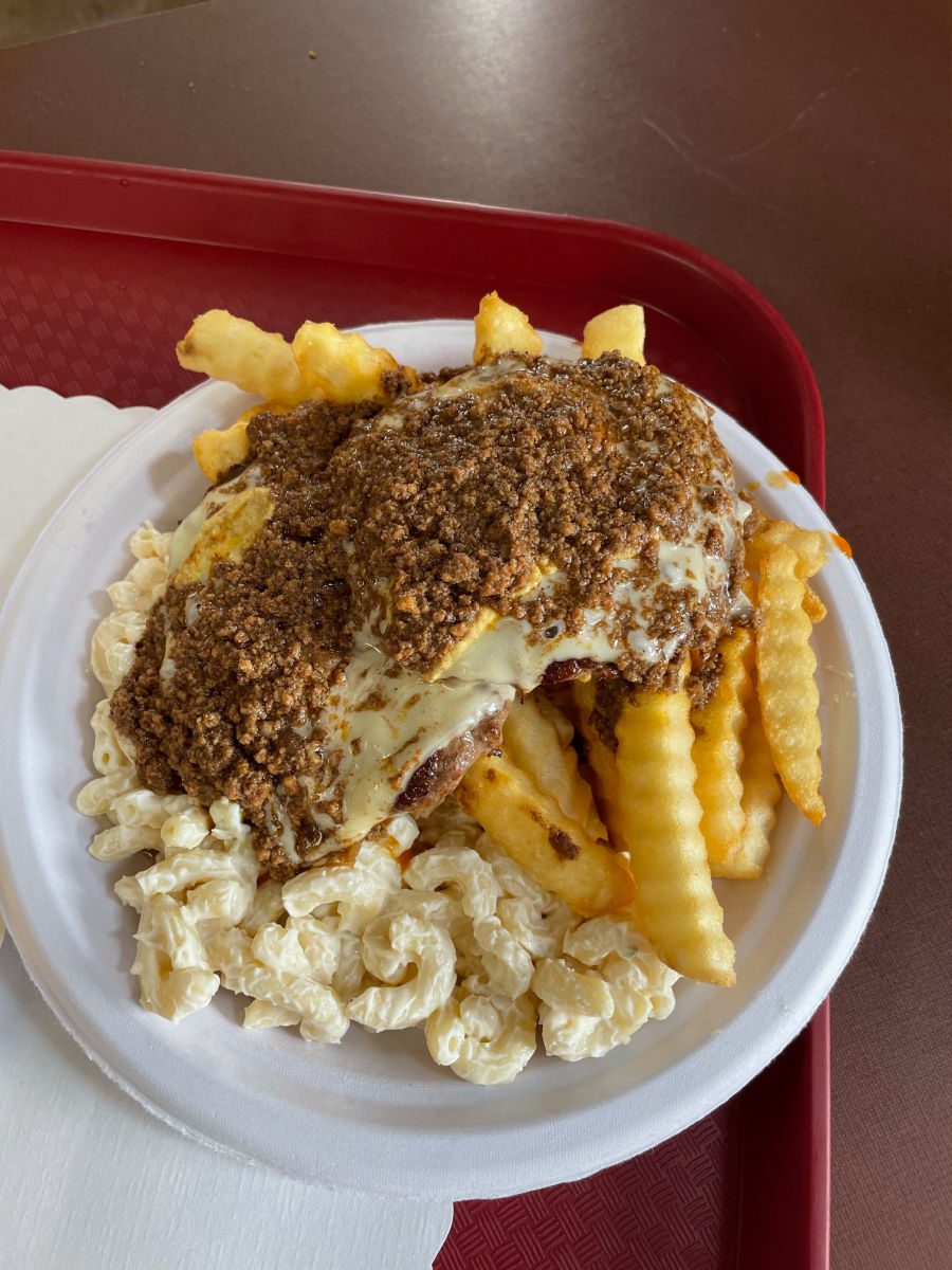 Garbage plate at Nick Tahou Hots with cheeseburgers, fries, and macaroni salad