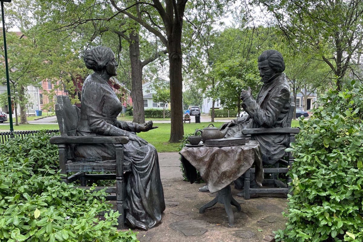 Susan B. Anthony and Frederick Douglass having tea statue in the park