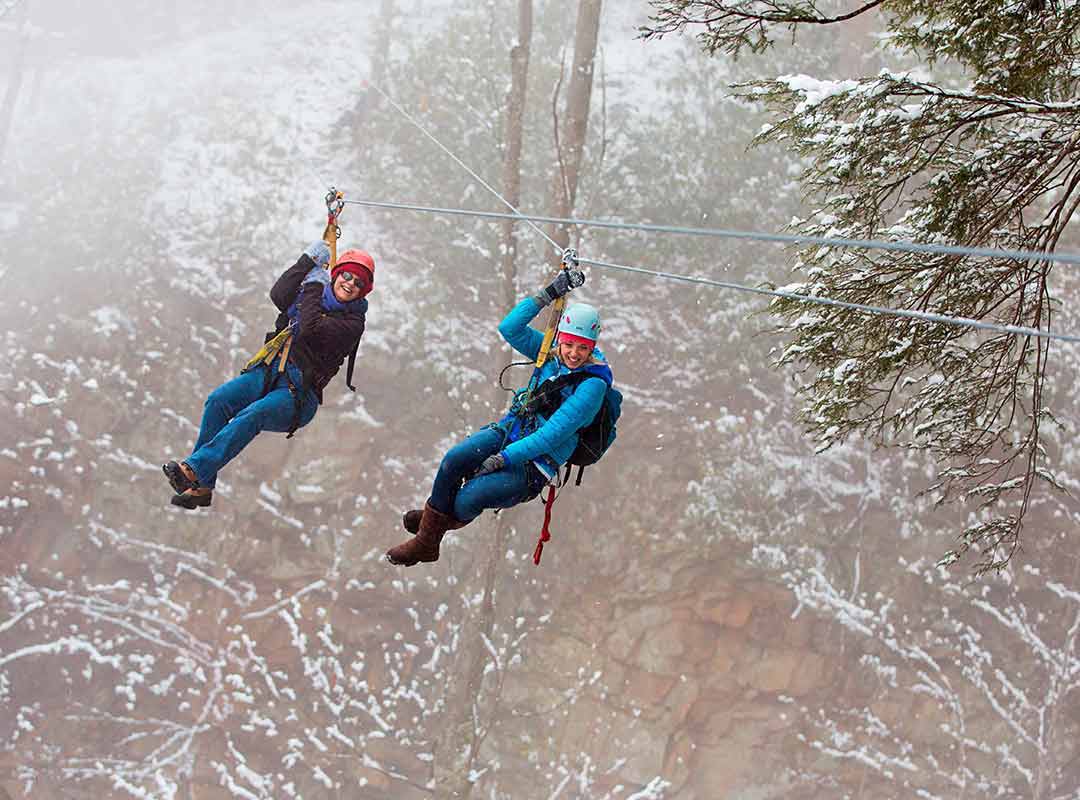 ziplining in the snow at Ace Adventure Resort