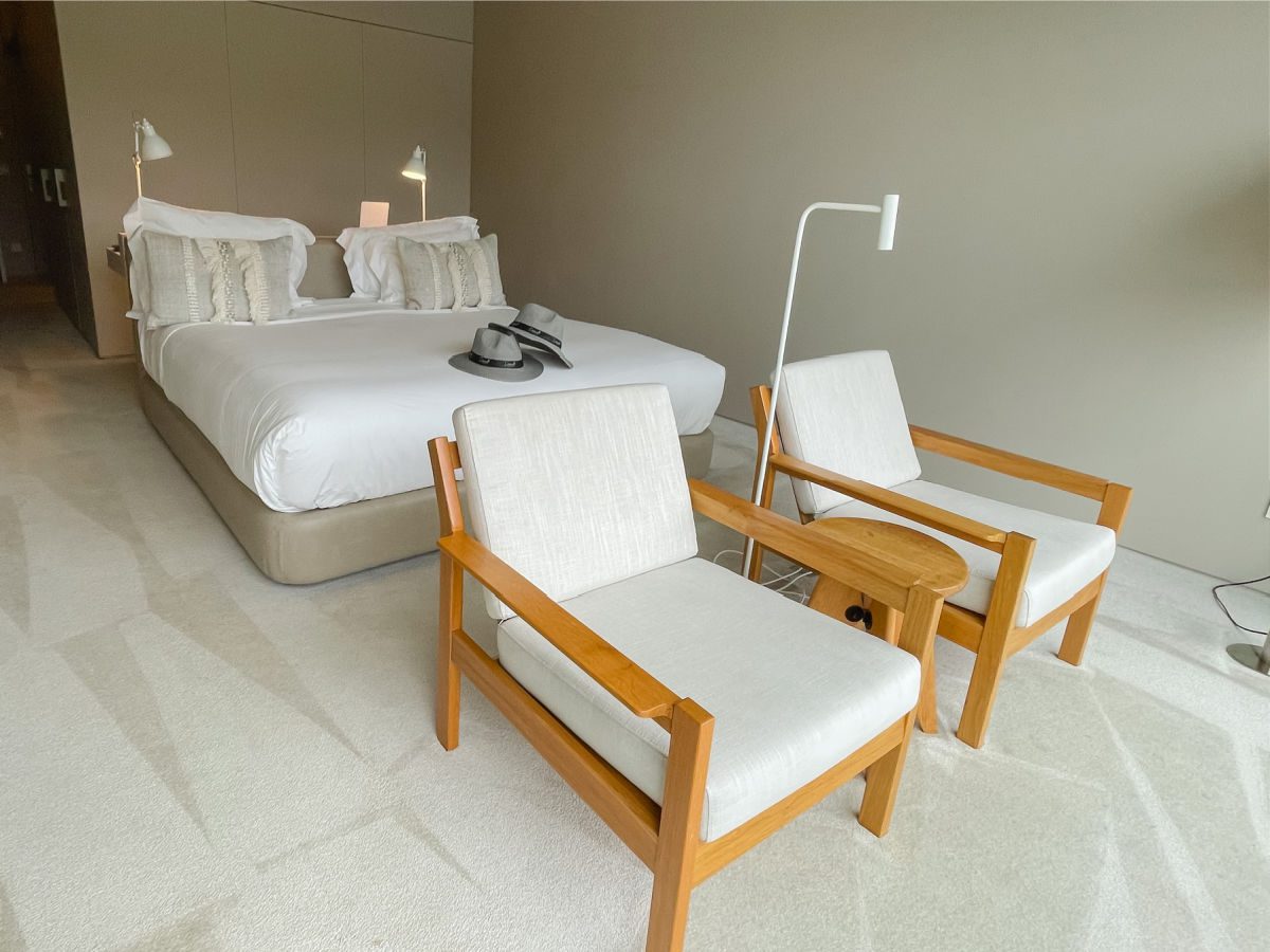 Douro41 bedroom with queen bed and chairs