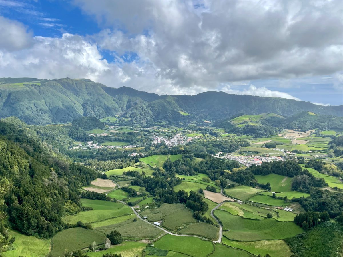 Looking down at Green fields and village in Furnas in the Azores