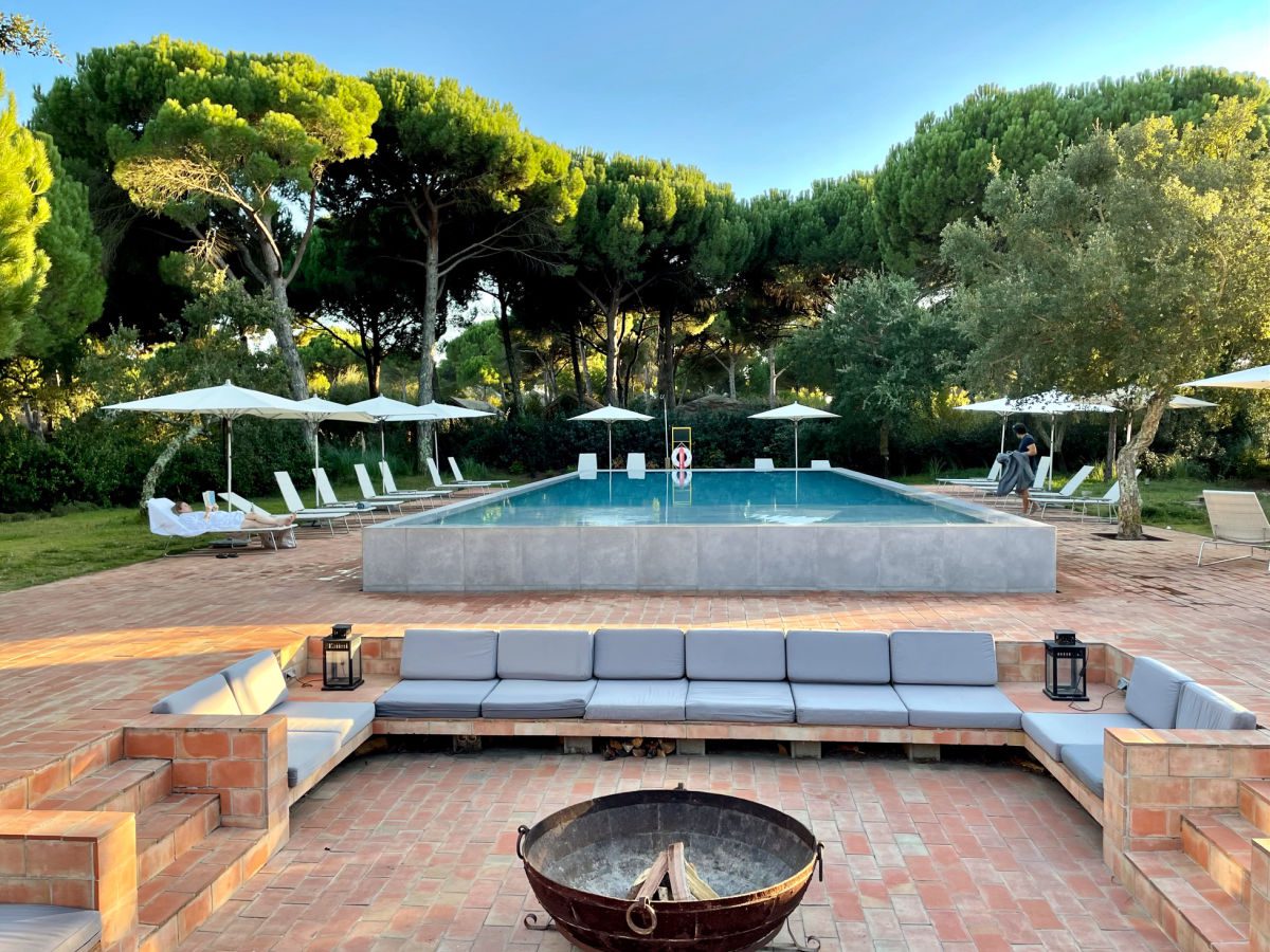 Pool and fire pit area at Sublime Comporta
