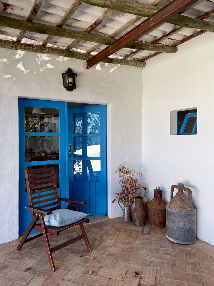 Morgado do Quintão blue door entrance to the Bouganvila vila