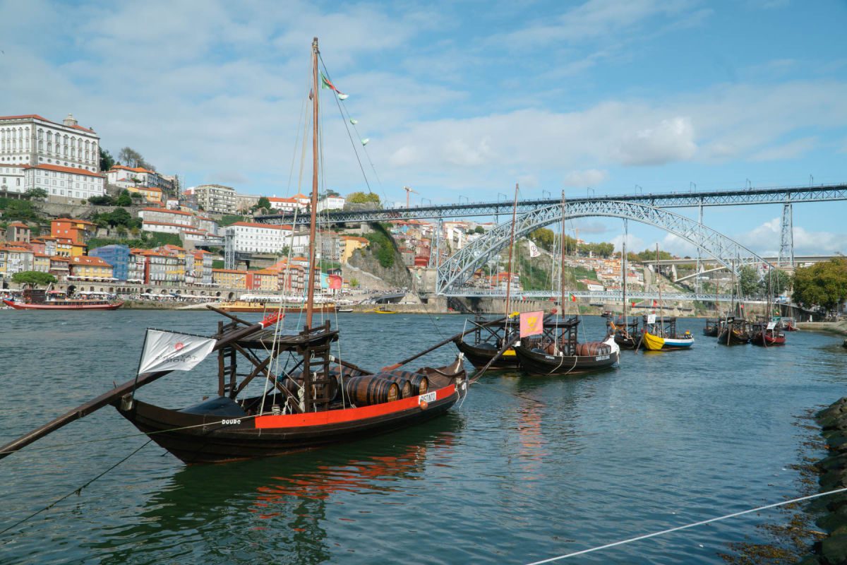 Douro River with boats and the Dom Luis I bridge