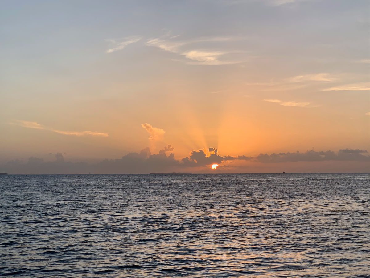 Sunset behind clouds