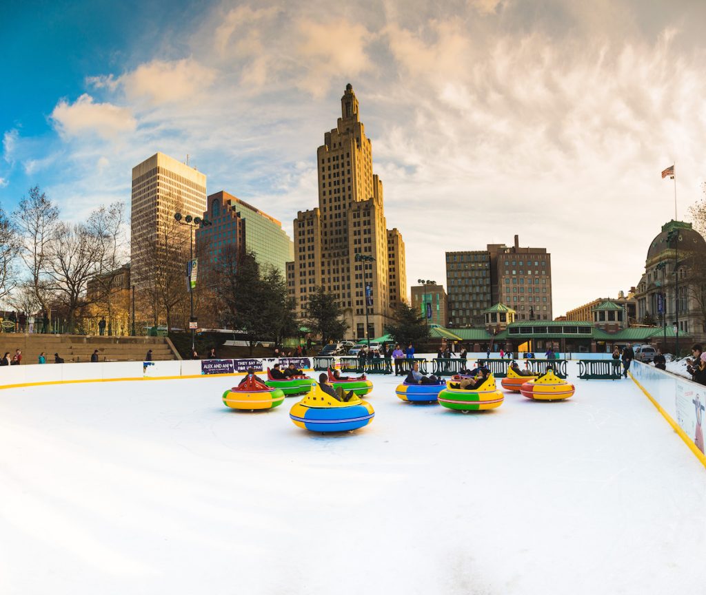 bumper cars on ice with providence skyline in the background