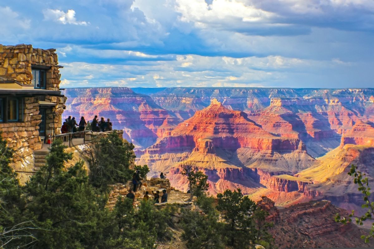 Grand Canyon with tourists at overlook from Canva