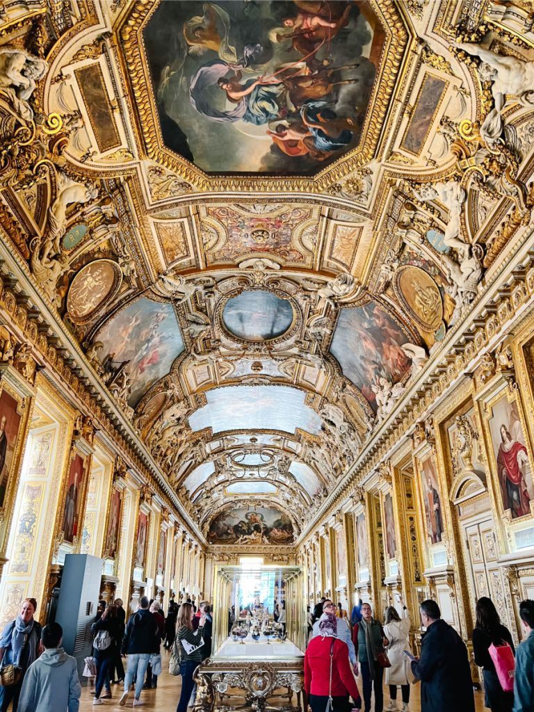 Gallery in the Louvre with paintings on the ceiling