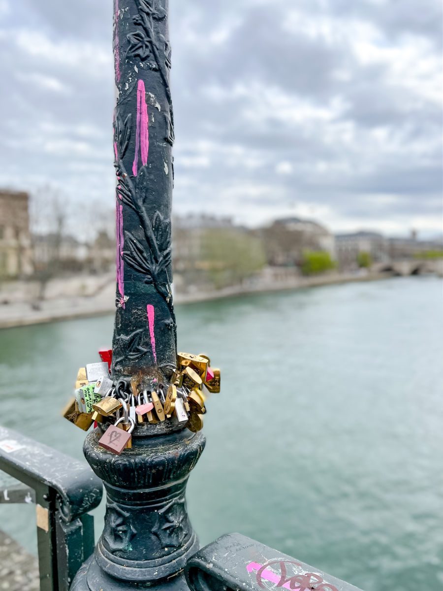 Locks on a lamppost on the Pont des Arts bridge in Paris