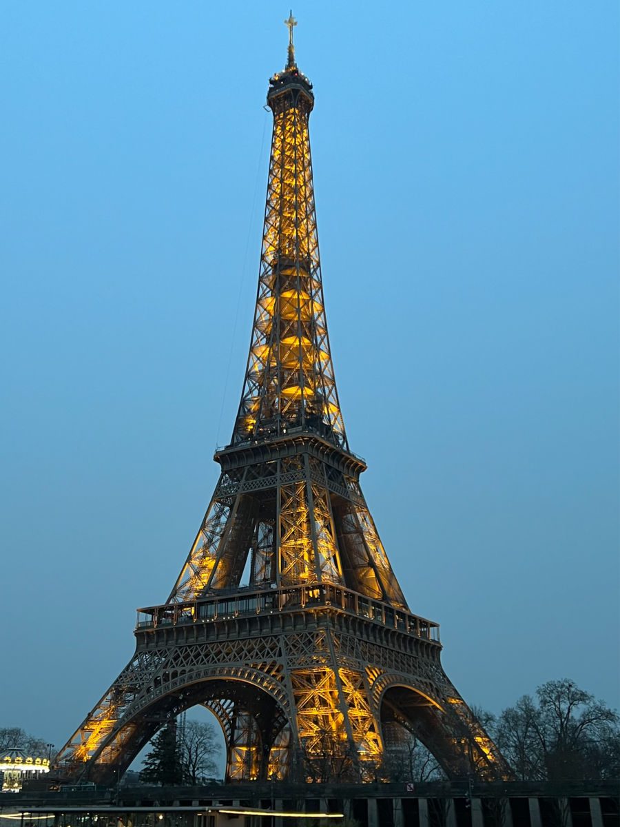 Eiffel Tower lit up in the evening