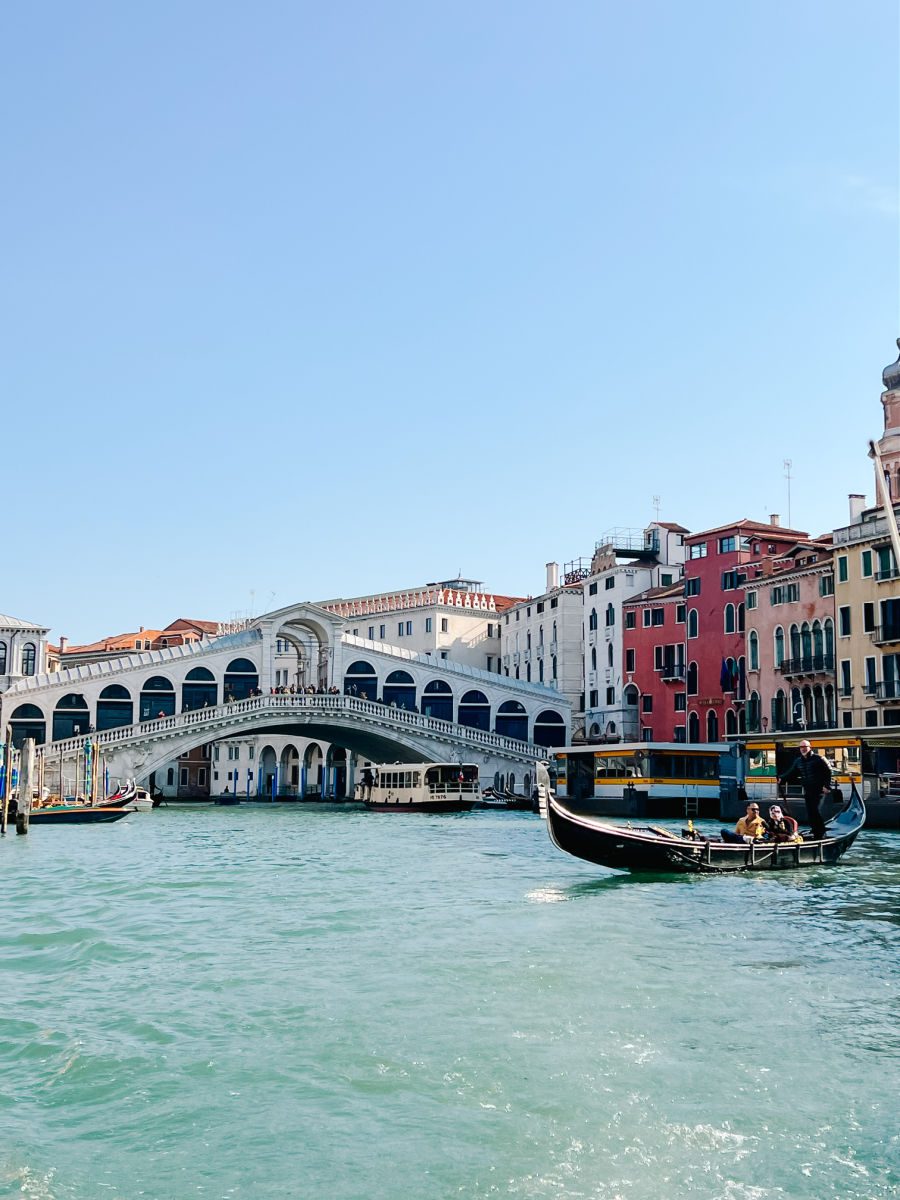 Gondola on the Grand Canal in front of the Rialto Bridge