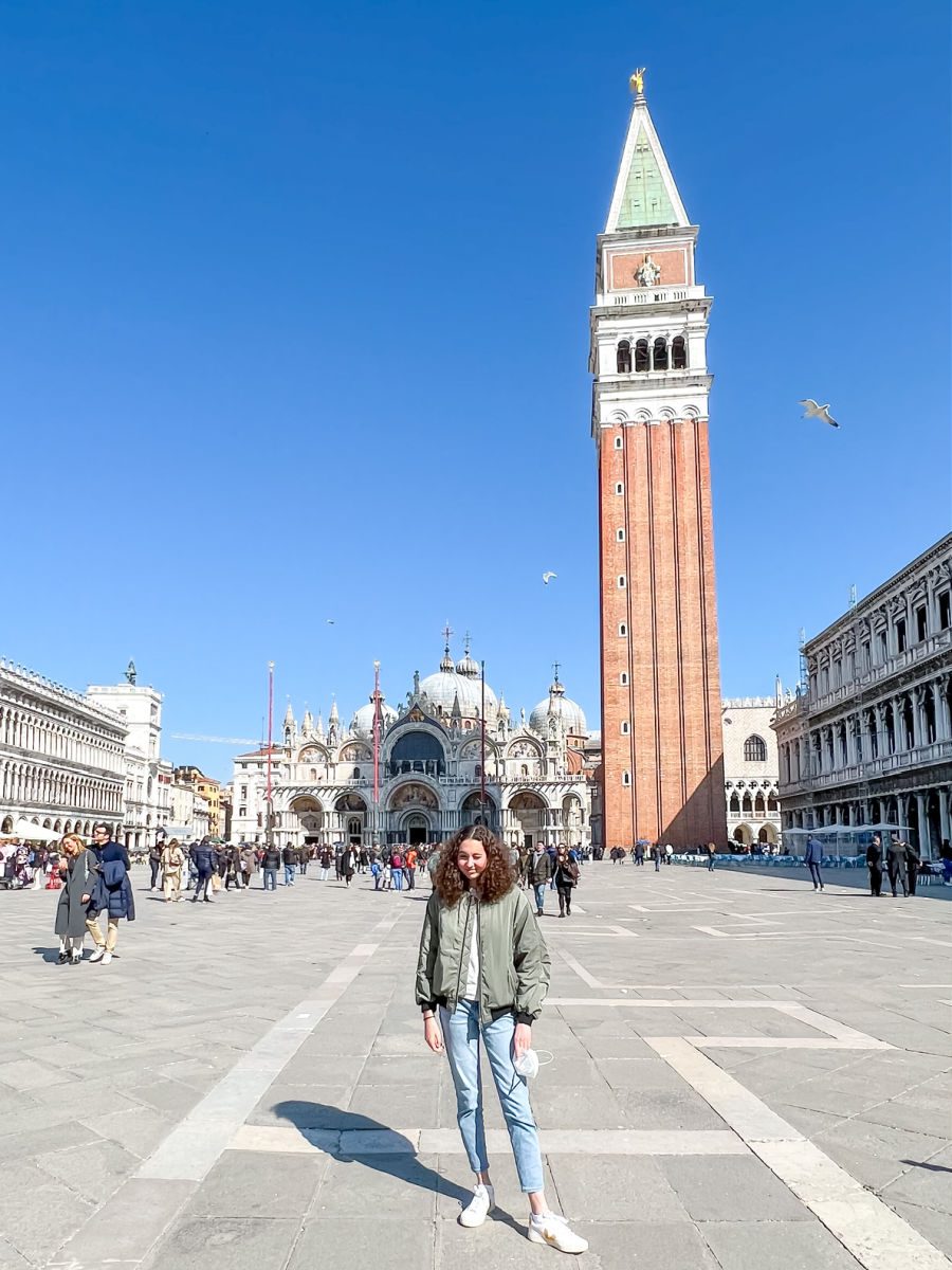 Girl in St. Mark's Square with the Campanile in the background