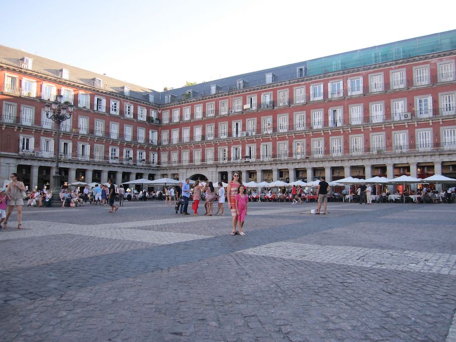Woman and daughter in Plaza Mayor in Madrid