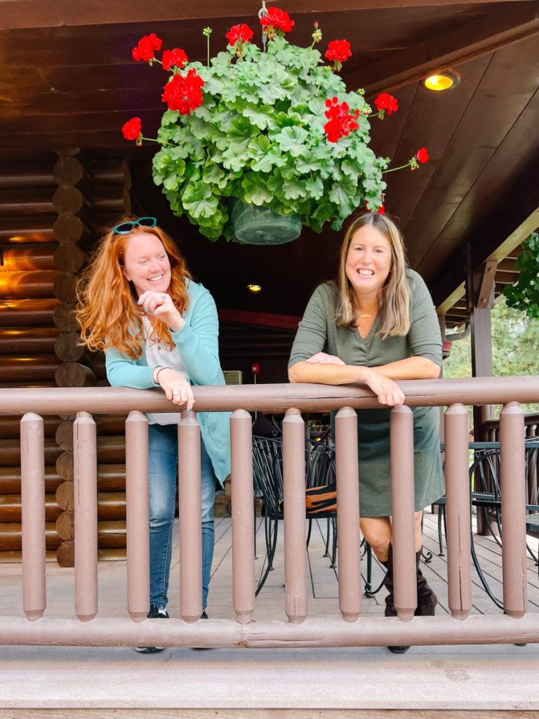 Keryn & Tamara on the porch of Harwood House at Quinn's Hot Springs Resorts