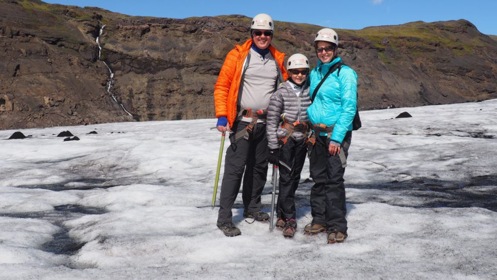 family on a glacier hike