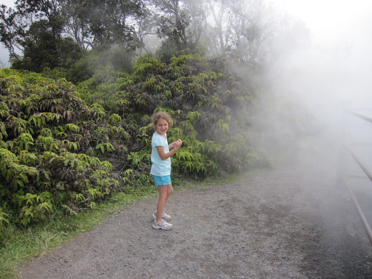 Girl by steam vent in Hawaii Volcanoes National Park
