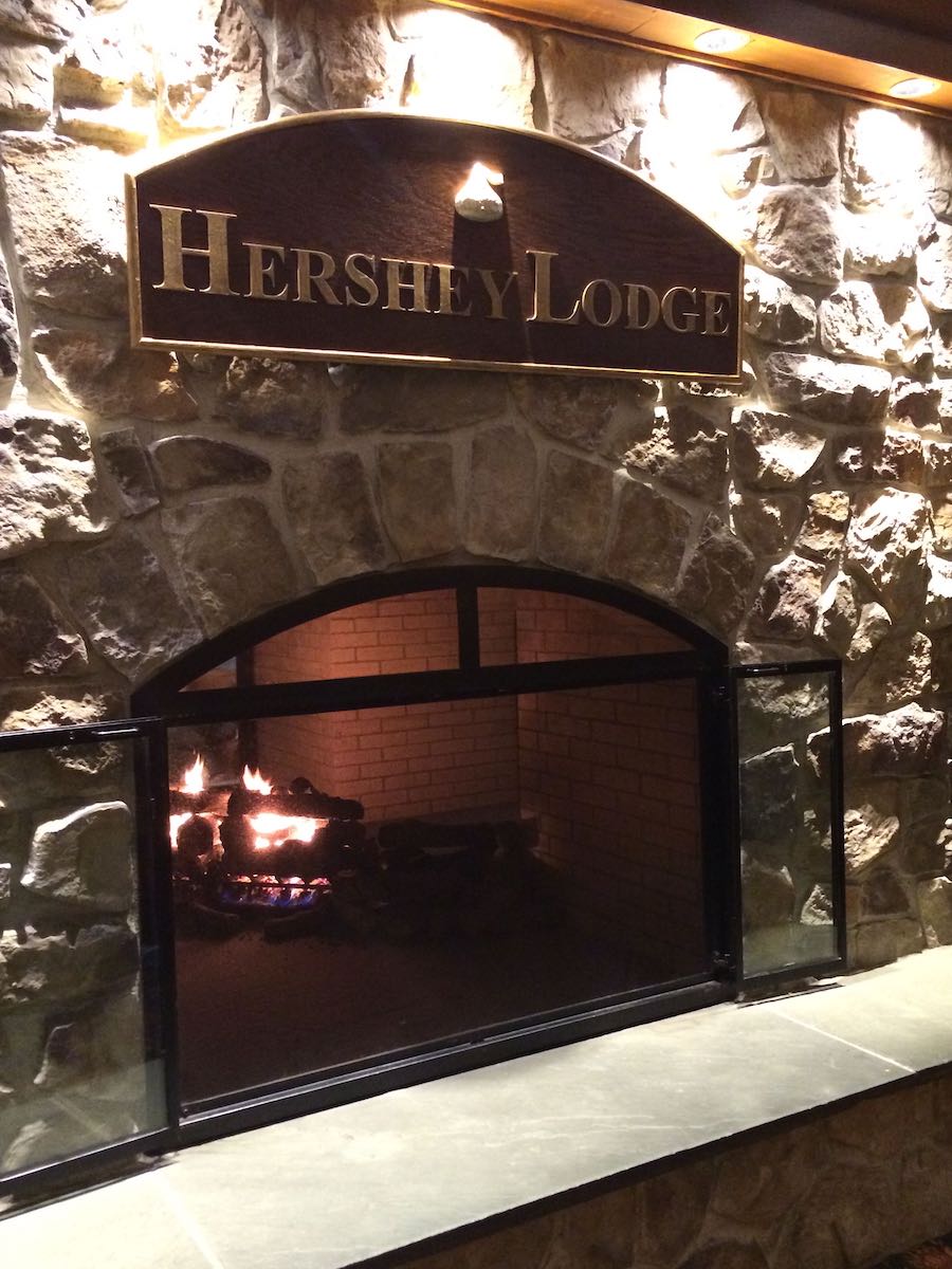 Hershey Lodge sign above a fireplace