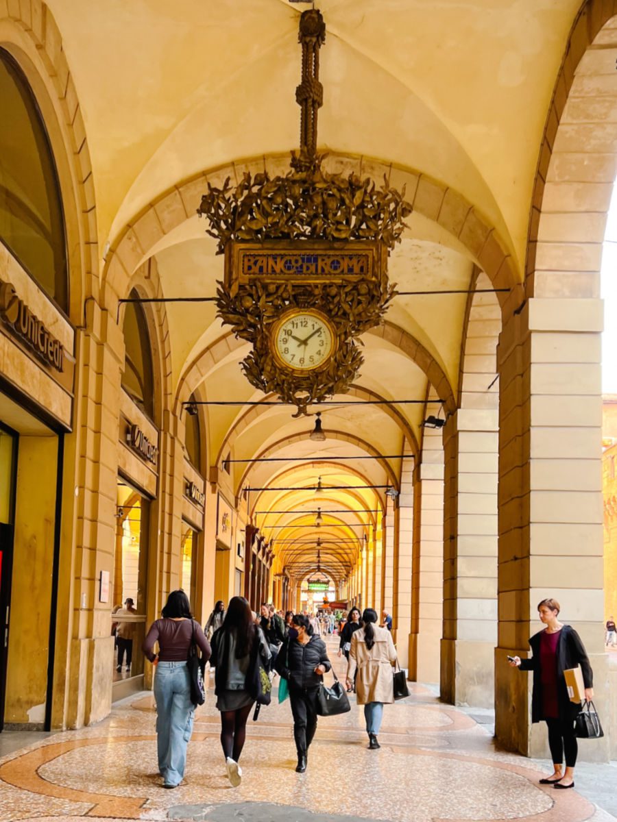 Bologna portico with clock