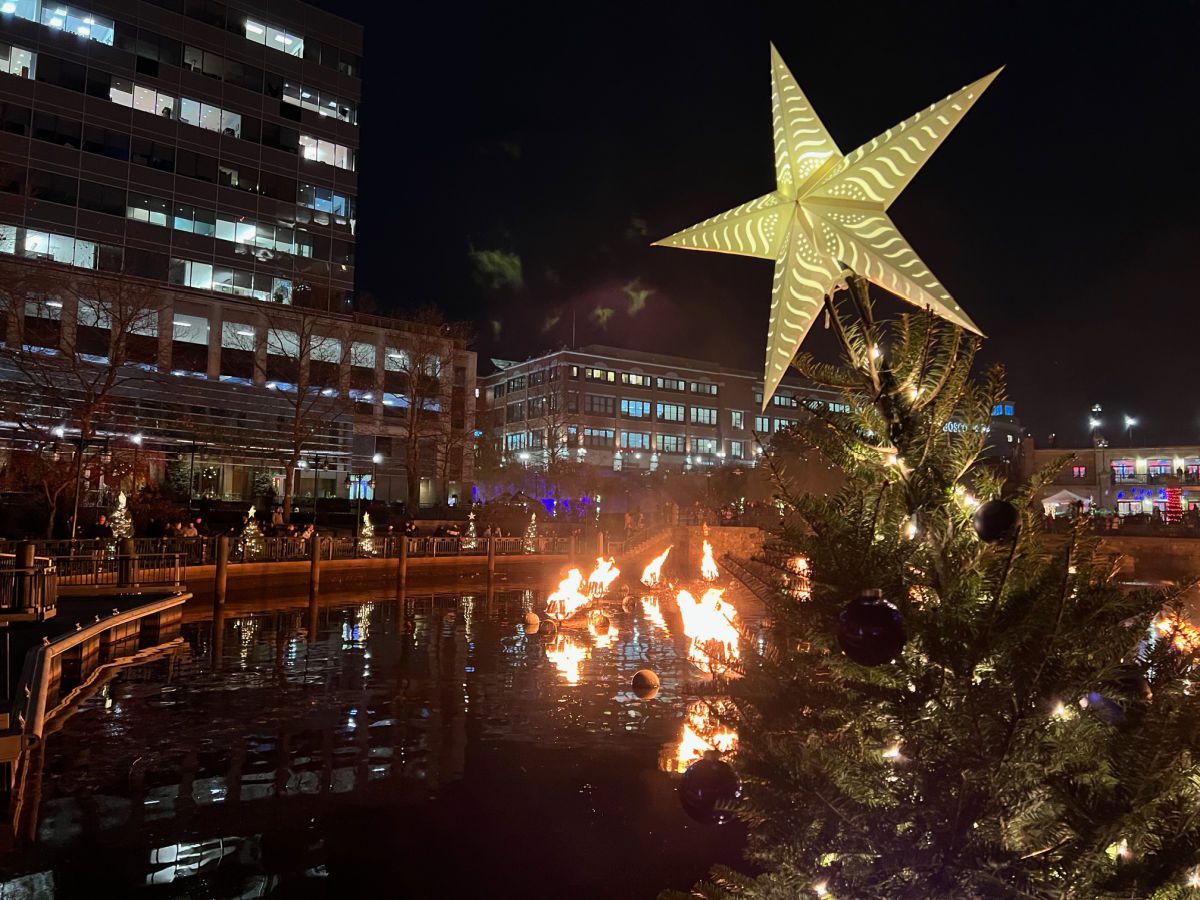 Christmas tree star in front of providence waterier