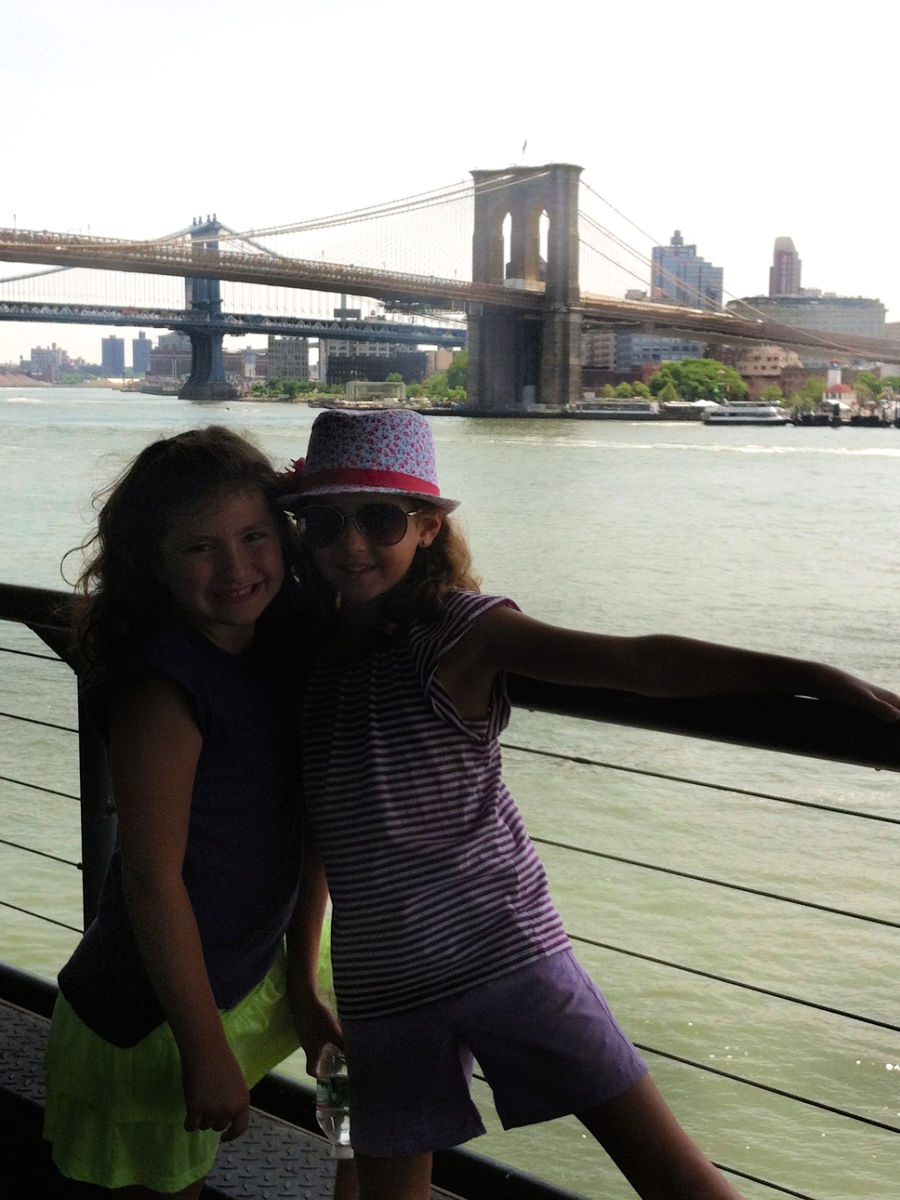 2 girls with the Brooklyn Bridge in the background