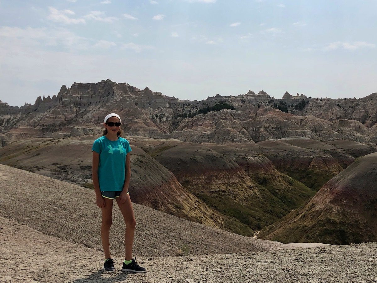 Girl at Yellow Mounds overlook in Badlands National Park