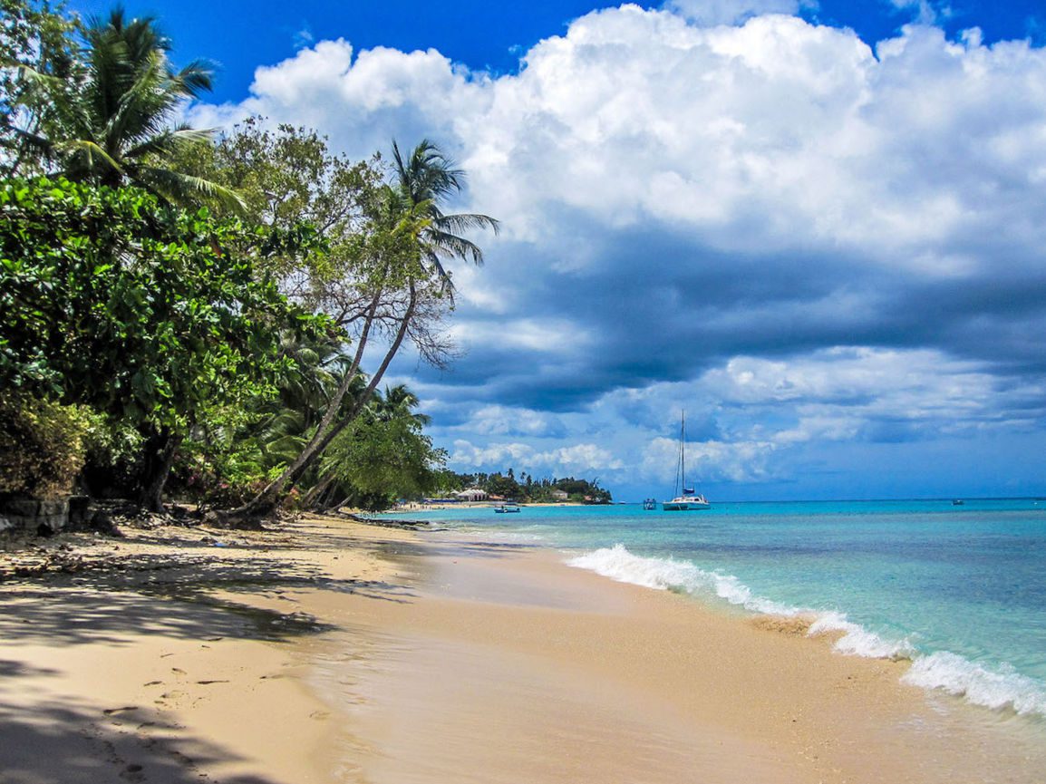 Barbados beach and sailboat