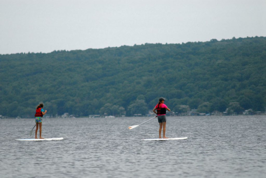 2 people kayaking on Keuka Lake
