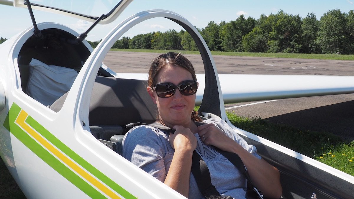 Tamara sitting in glider plane