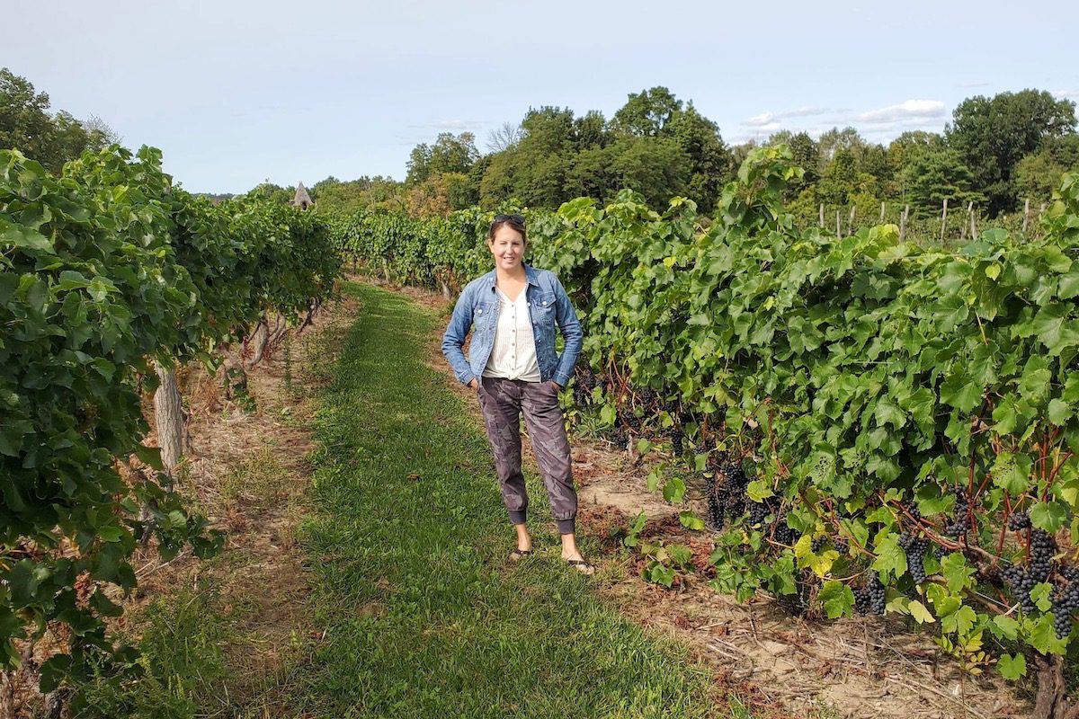 Tamara standing in vineyard