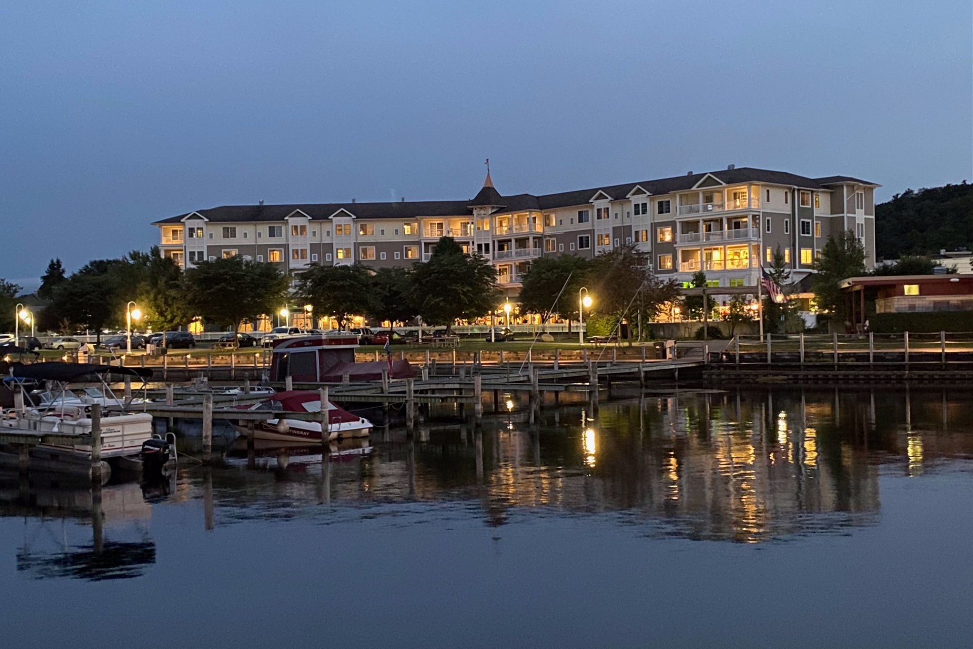 Watkins Glen Harbor Hotel at night from the water