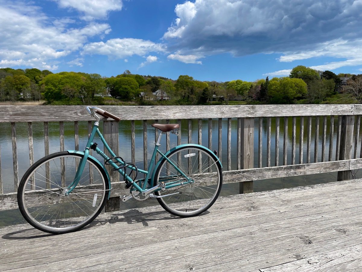 bike leaning against railing near marsh on Shining Sea Bikeway